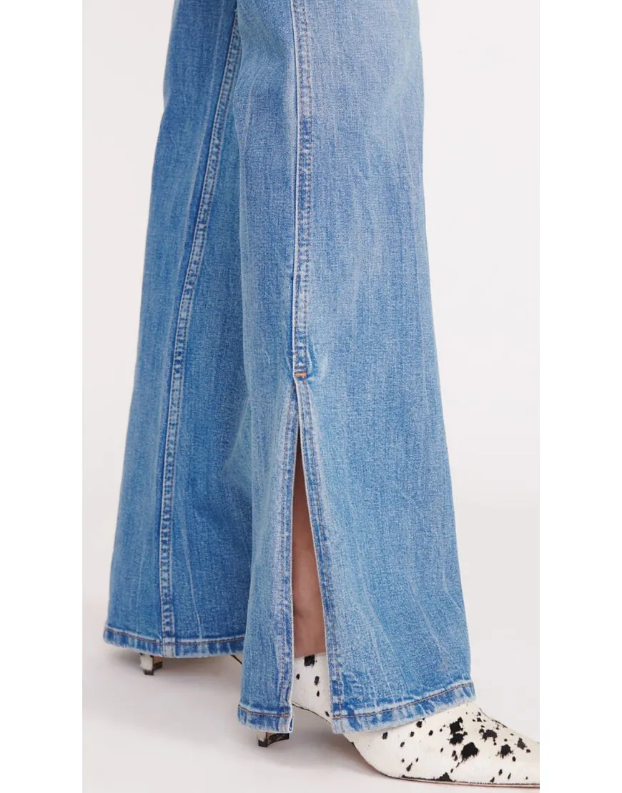 Flared Jeans with Slit Hem in Mid Blue